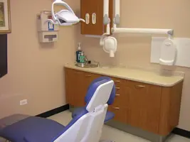 Dental office with a blue dental chair